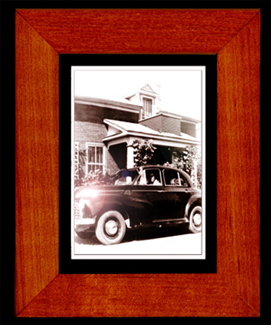 A Digitally Framed car in front of grandma's house.