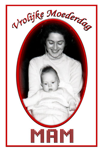 Black & White ′50′s photograph of proud mother holding baby