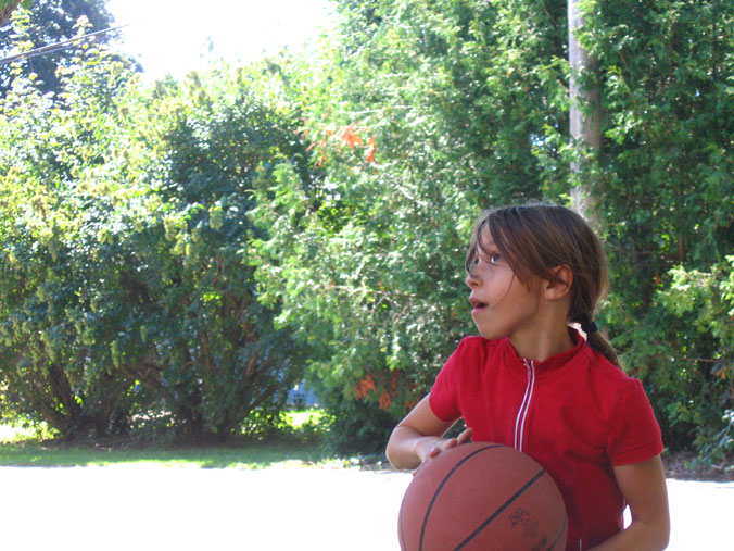 Girl poised to shoot a basketball